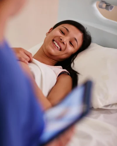 Patient smiling after Ortho surgery