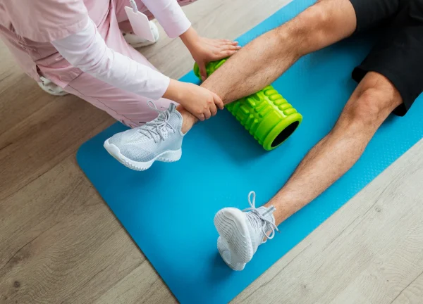 Doctor performing physiotherapy
